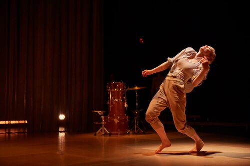 Justine Cooper leaned back in movement