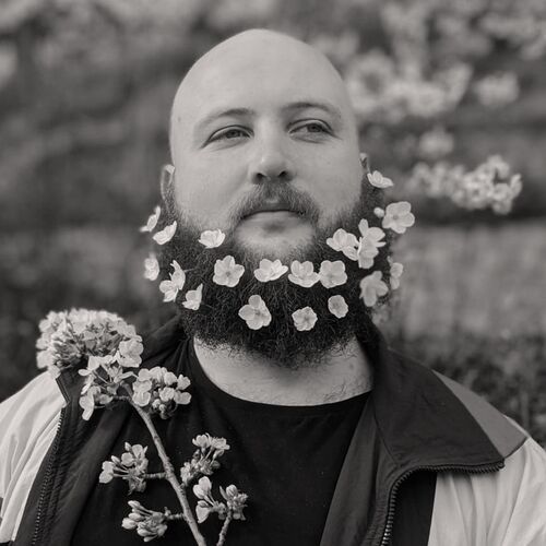 Black and white headshot of John Gunning