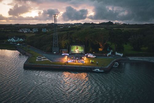 Querrin pier and handball alley seen from above across the sea