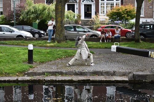 Favour Odusola in movement at the side of the Grand Canal