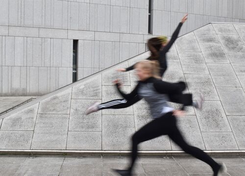 Two figures in blurred motion