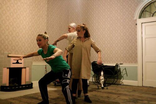 Cathy Coughlan in movement with two participants