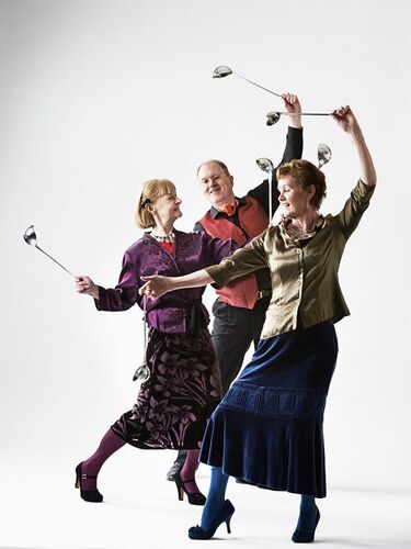 Three figures in movement each with a ladle in each hand
