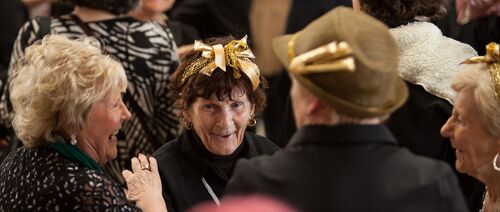 A close up of participants laughing in a group