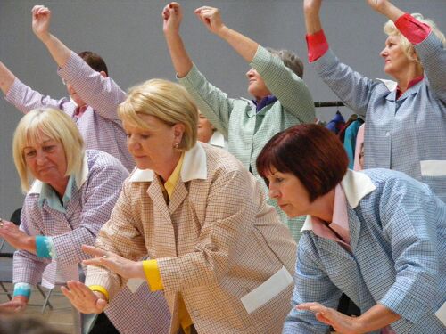 Participants in movement in two lines