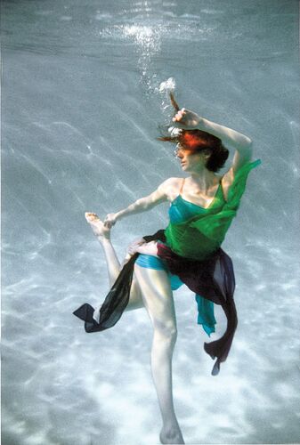 A figure in movement under water