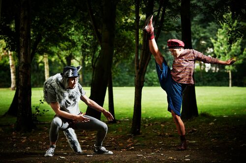 Ivonne Kalter & Mateusz-Szczerek in movement in a wooded setting outdoors