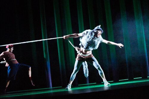 Mateusz-Szczerek pulling away from a length of rope tied to his waist