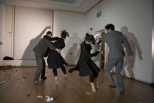An ensemble of participants in movement in pairs