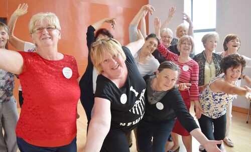 Participants smiling and posing towards the camera