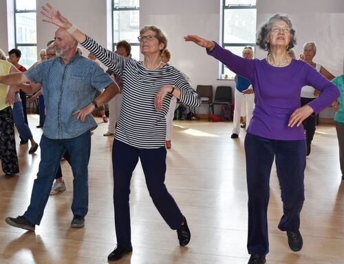 Participants in movement in a hall