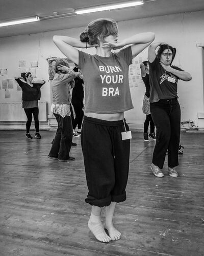 An ensemble of women in movement