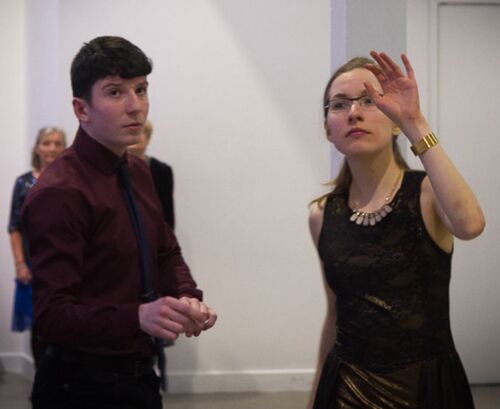 Two participants in movement side by side