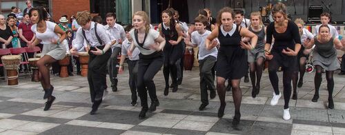 An ensemble of participants in the same movement