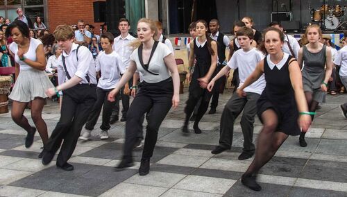 An ensemble of participants in the same movement