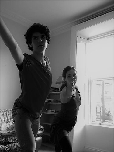 Two participants in movement in black and white