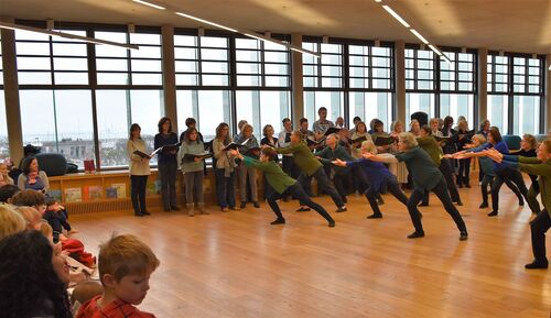 Older participants in movement performing in front of an audience