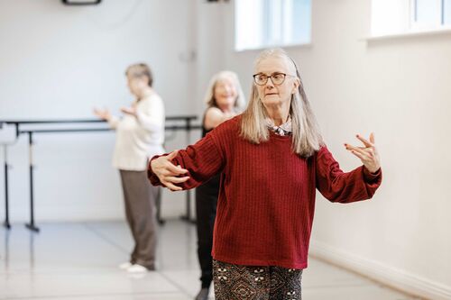 A participant in movement in a studio