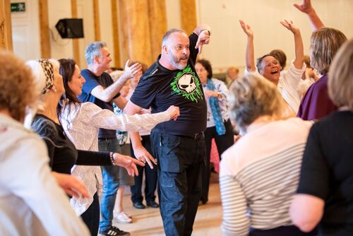 A group of participants dancing