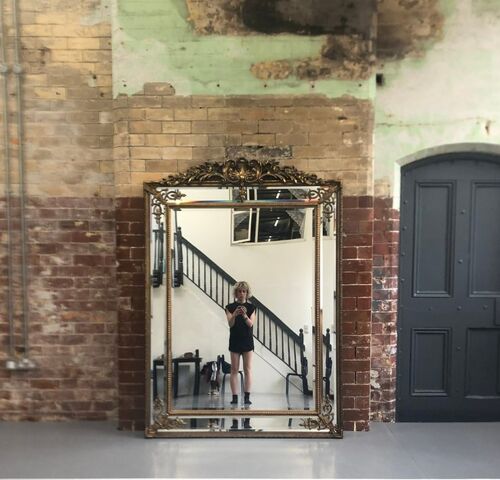 A woman talking selfie in a mirror