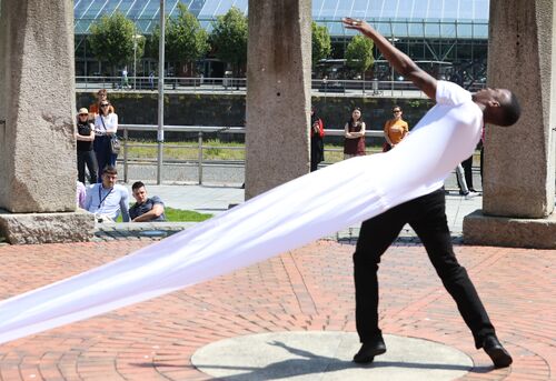 A dancer performing outdoors