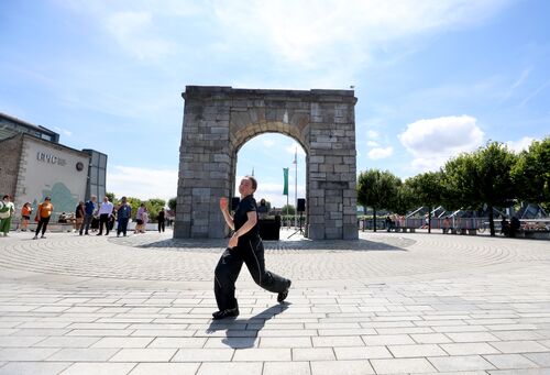 A dancer performing outdoors