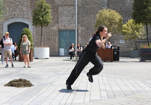 A dancer performing outdoors