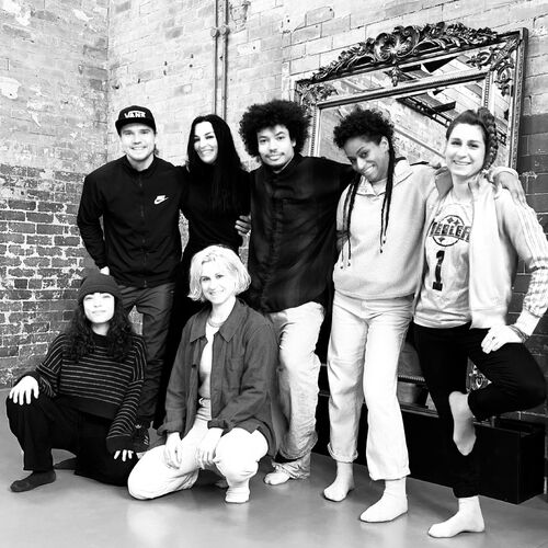 Group of people standing for a photo shoot