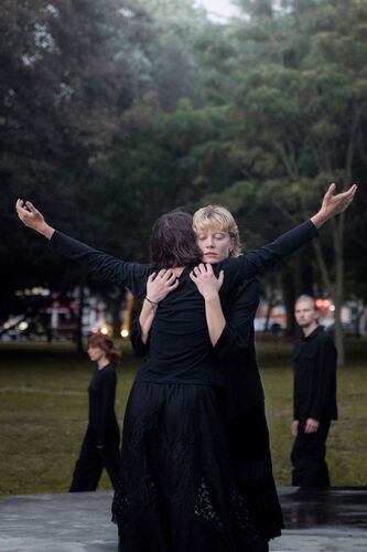 A dancer hugging a dancer