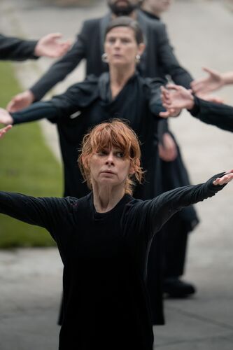 Dancers in a movement with open arms