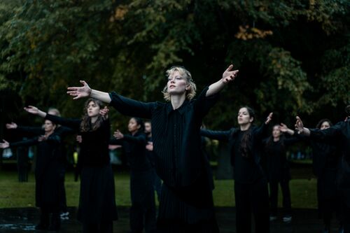 Dancers in a movement with open hands