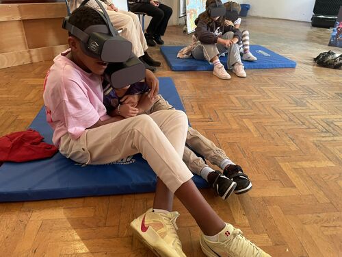 Kids in VR goggles.JPEG