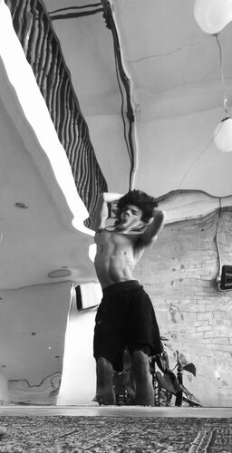 A dancer's reflection in a mirror